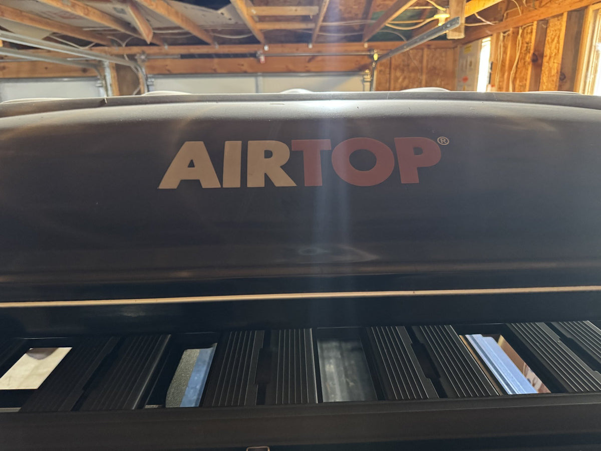 AIRTOP badge on the shell of the Airtop 360 rooftop tent — photo 31
