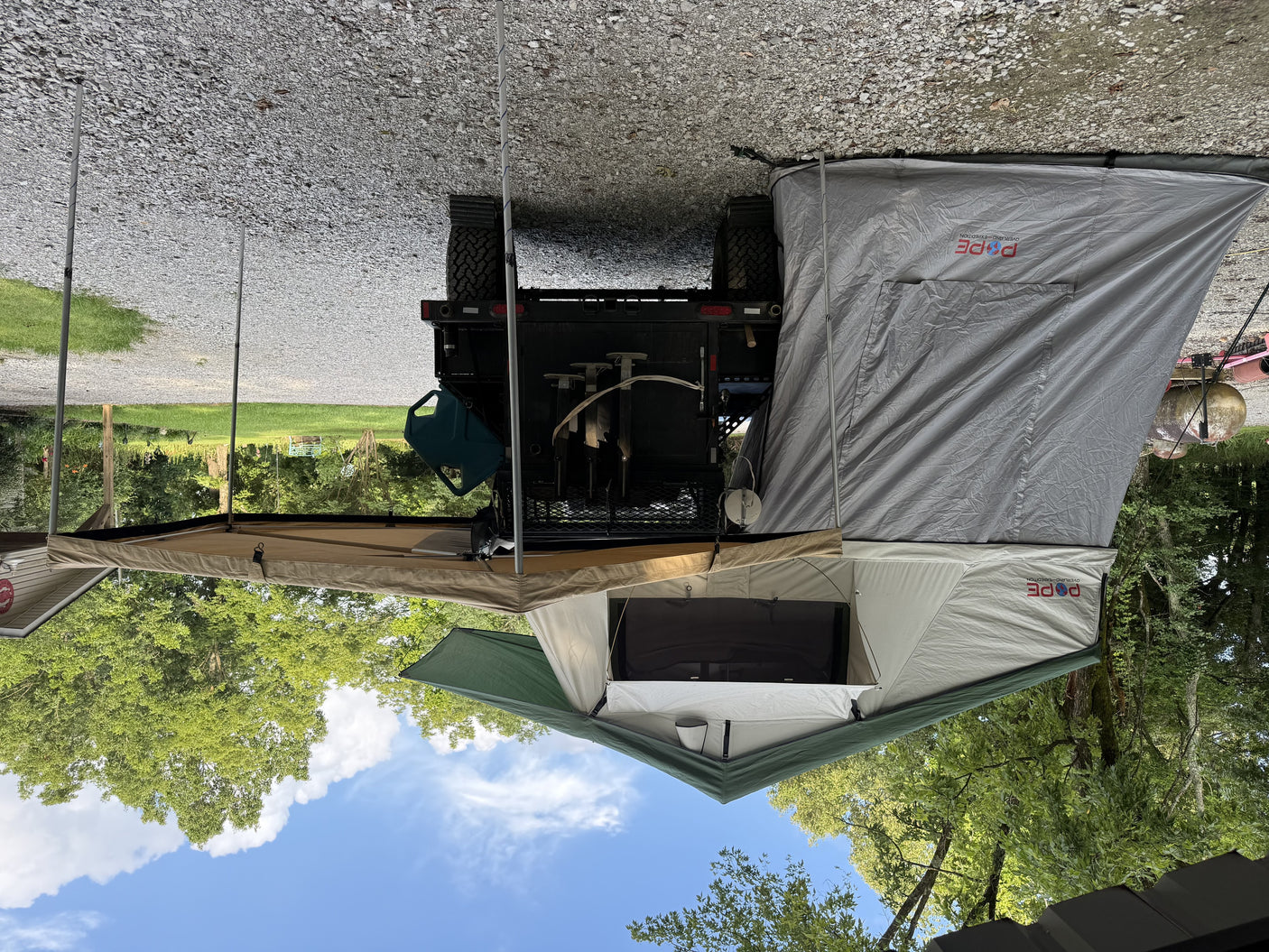 Pope Overland rooftop tent fully set up with annex room and 270-degree awning deployed
