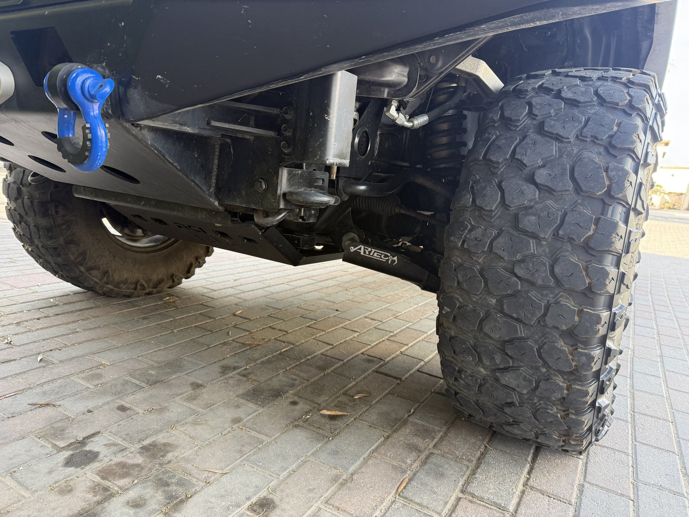 Underbody view of RCI full skid plate and ICON suspension — photo 9
