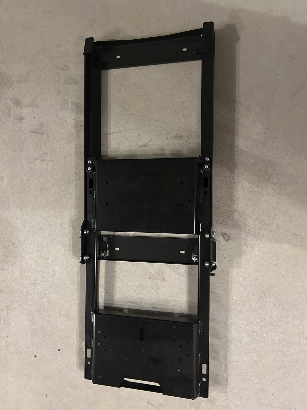ARB Zero fridge slide, top-down view of the full black powder-coated steel slide with mounting plate and runners — photo 1