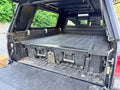 Decked truck bed drawer storage system