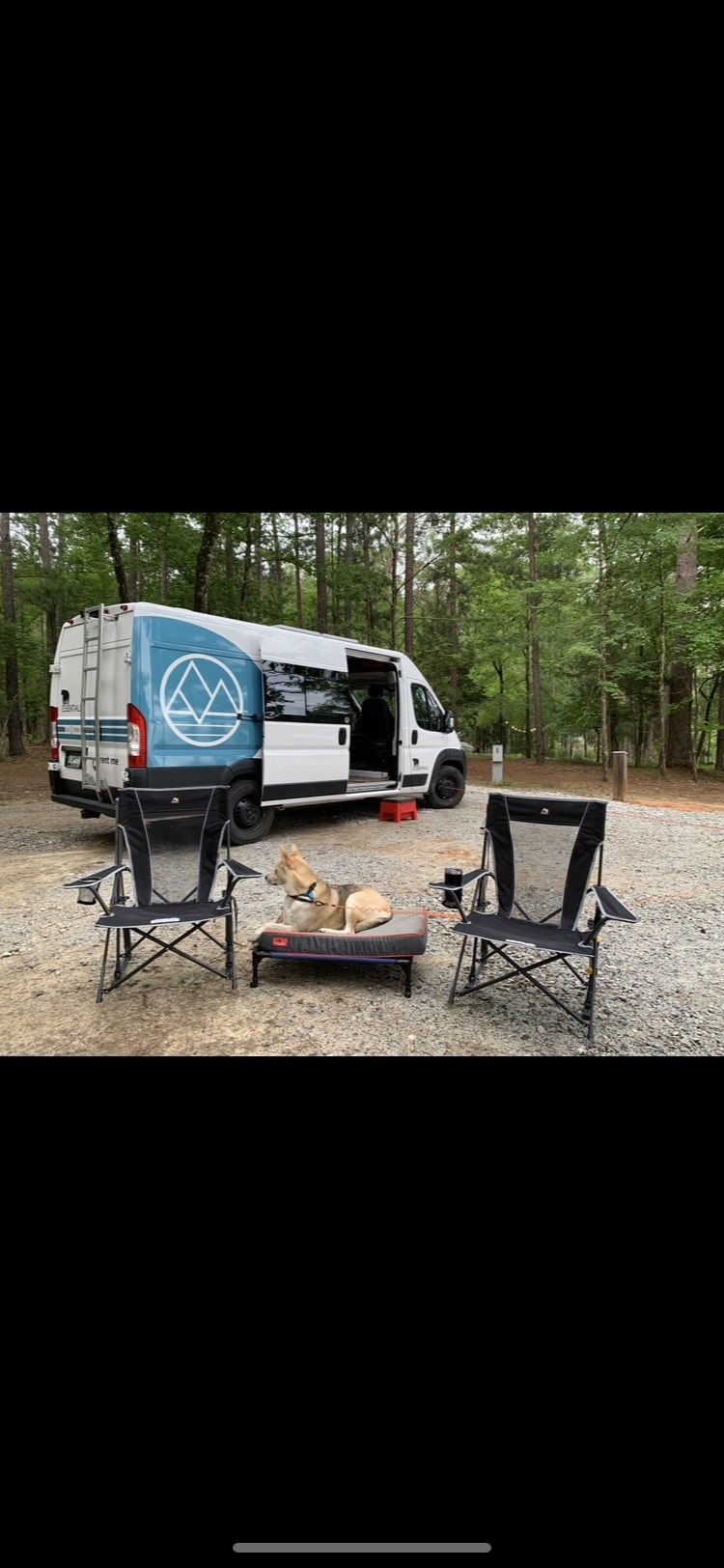 Pet-friendly rv rental parked at a peaceful campsite