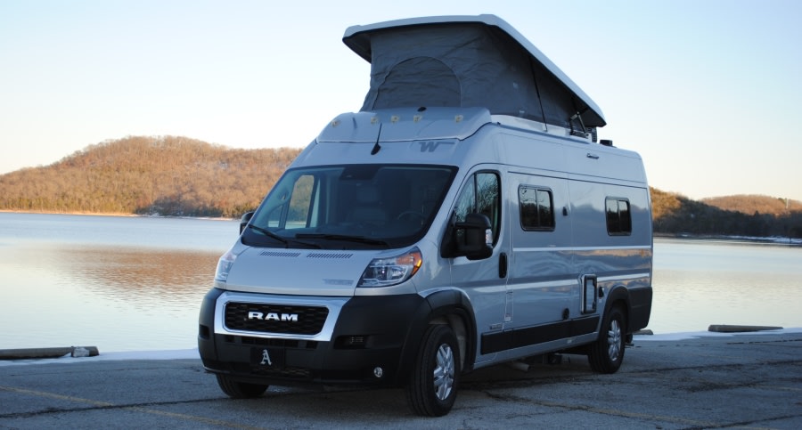 This sleek grey pop-top camper van is ready for your next RV rental adventure