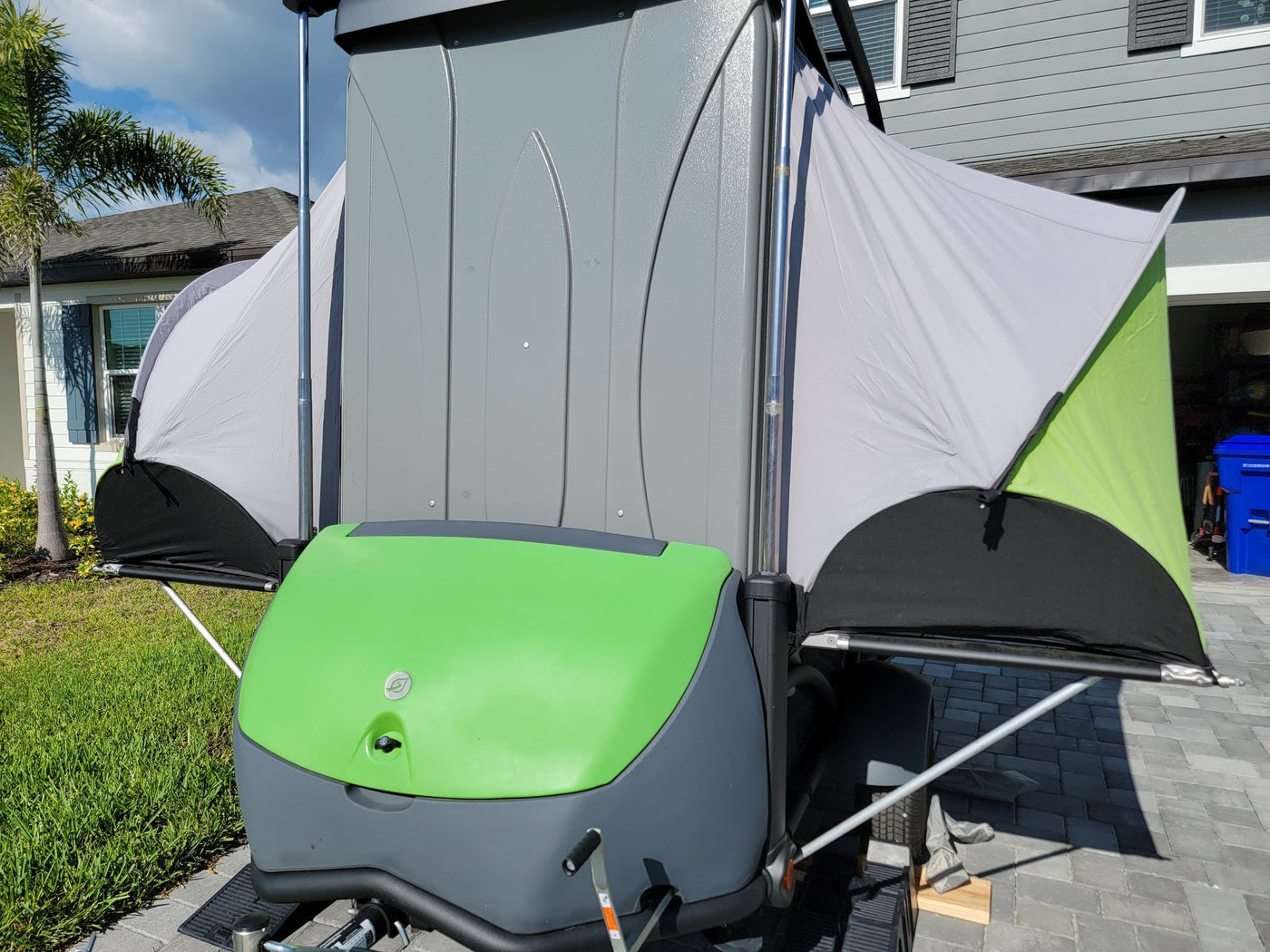 set up in a grassy field.|Inside an RV rental — photo 8
