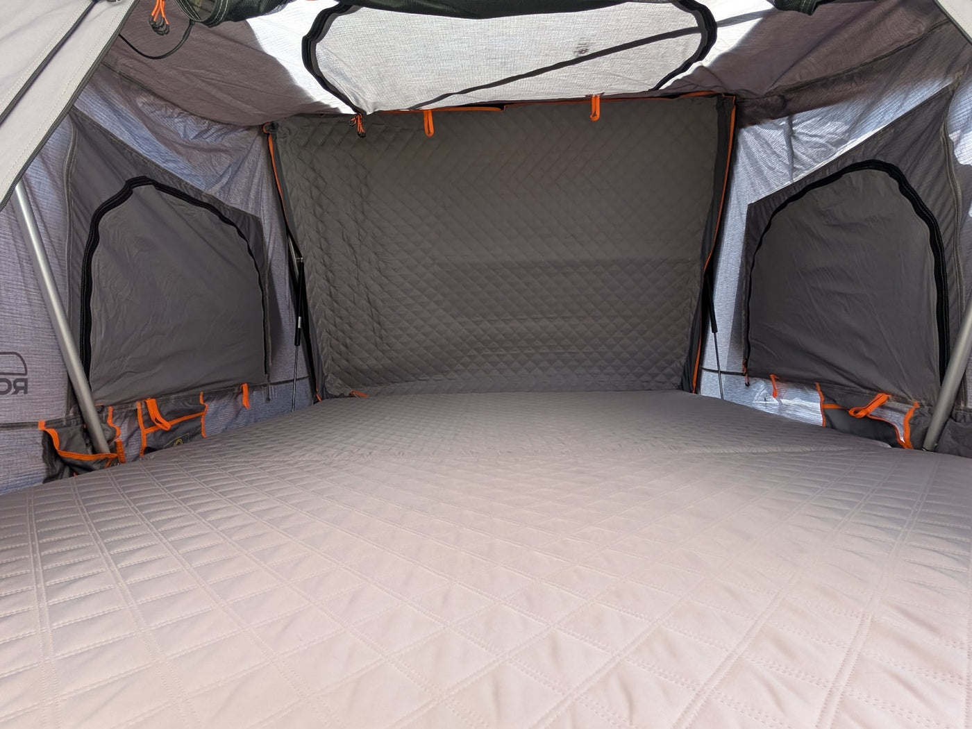 equipped with a rooftop tent for your next RV rental overlanding adventure.|Explore off-road! This red Ford Raptor pickup — photo 16