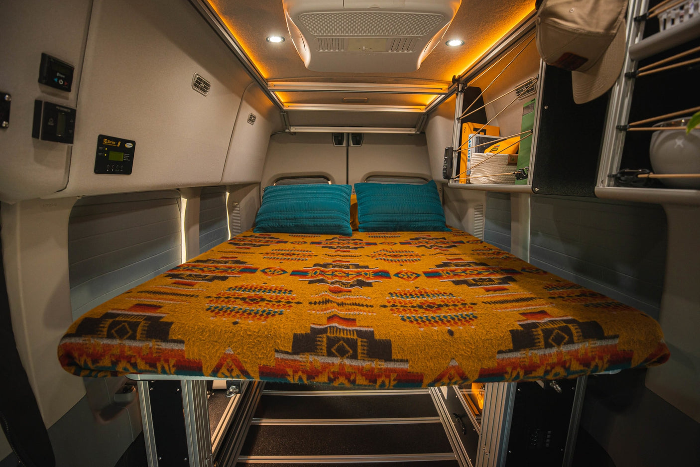 ready for adventure.|Olive green custom RV rental camper van with open door