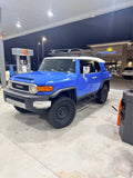 Blue Toyota FJ Cruiser with roof rack. 2007 Toyota FJ Cruiser 4x4 - Clean Title - Well Maintained
P