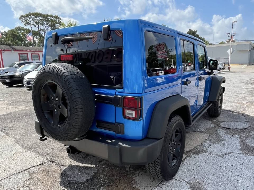2016 Jeep Wrangler Unlimited Black Bear 4x4 4dr SUV in Houston, TX (photo 8) — photo 8