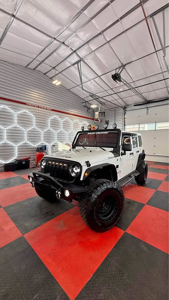 2013 Jeep Wrangler · Unlimited Sahara Sport Utility 4D in Commerce City, CO (photo 1) — photo 1