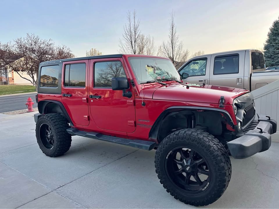 2014 Jeep Wrangler Unlimited · Sport in West Jordan, UT (photo 1) — photo 1