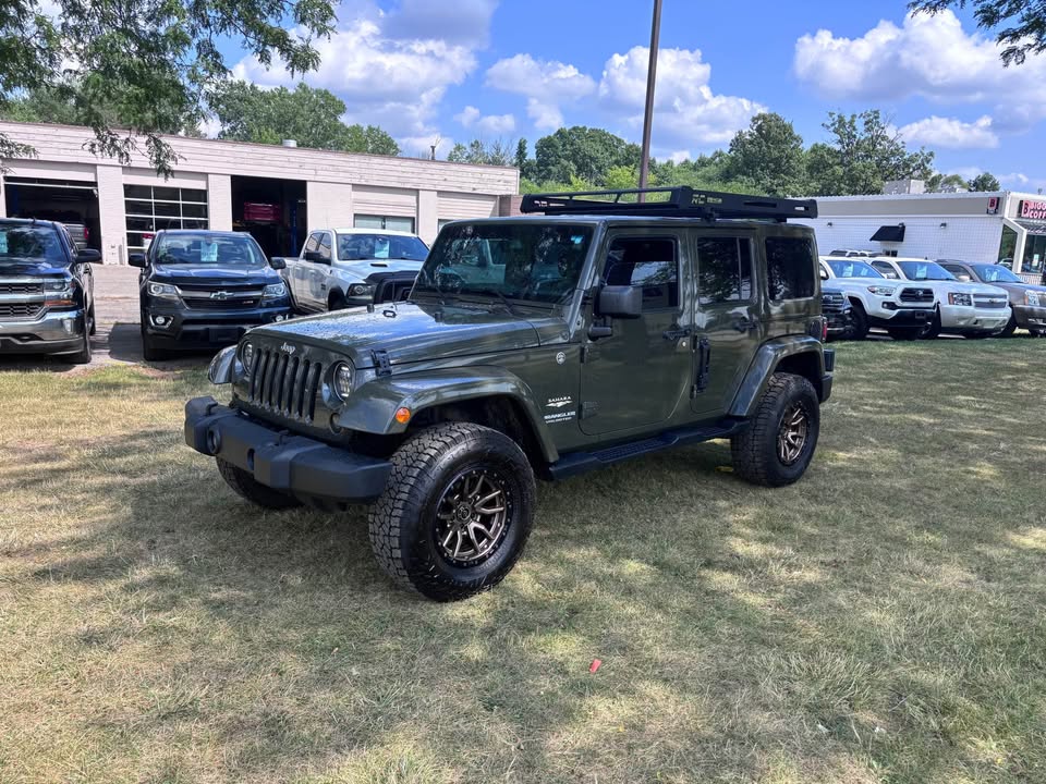 2015 Jeep Wrangler · Unlimited Sahara Sport Utility 4D in Flint, MI (photo 6) — photo 6