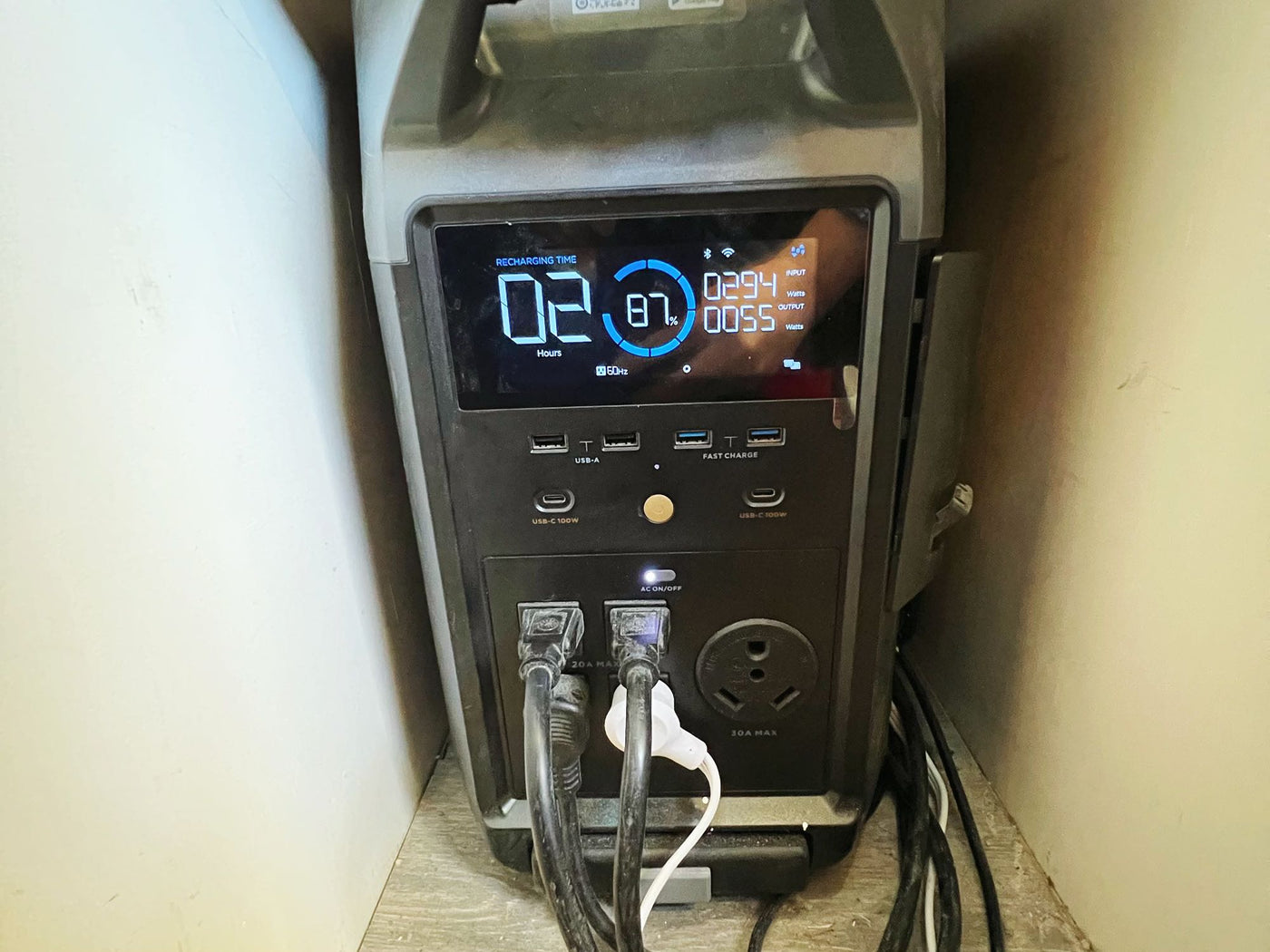 and bed.|Compact Dometic stove & sink in an RV rental kitchen. Features a two-burner cooktop — photo 19