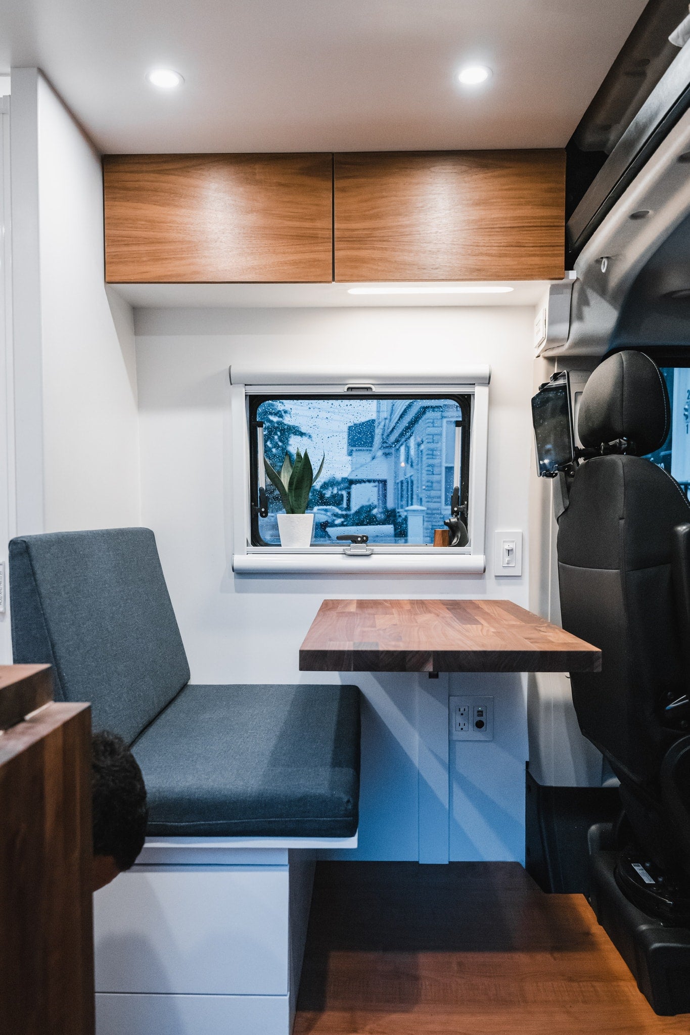 and a comfortable bed.|Interior of an RV rental: a modern