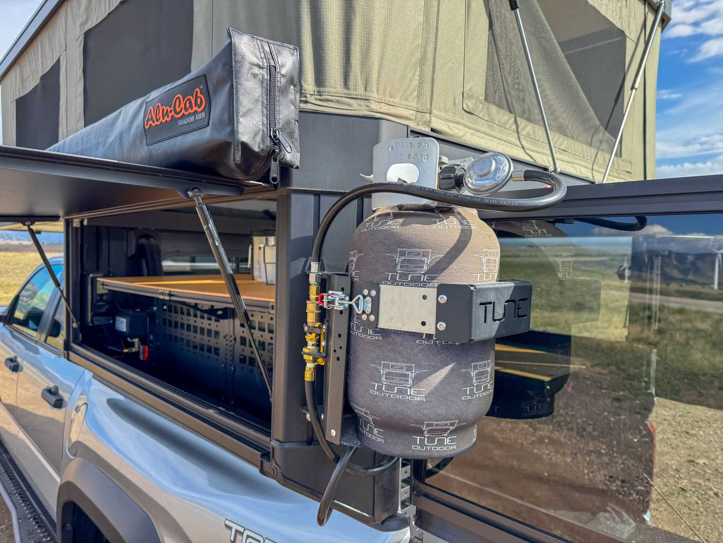 ready for an rv rental adventure in the mountains.|Overland RV rental: Alu-Cab awning