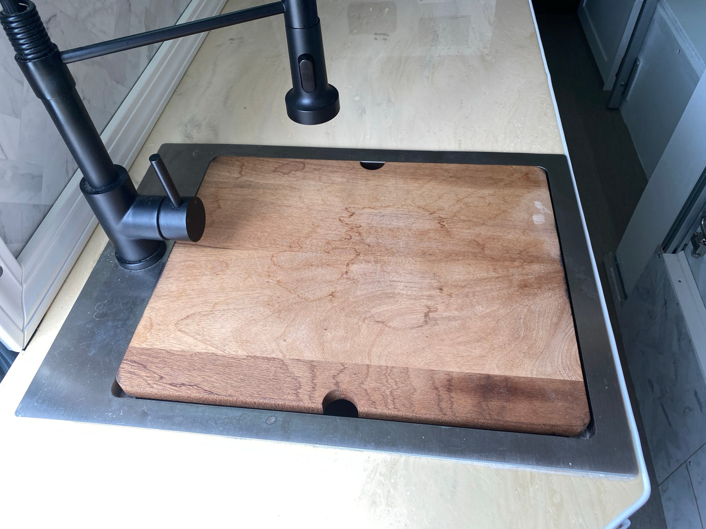 and wood ceiling. Ready for your adventure!|Luxurious RV rental interior featuring a GE microwave