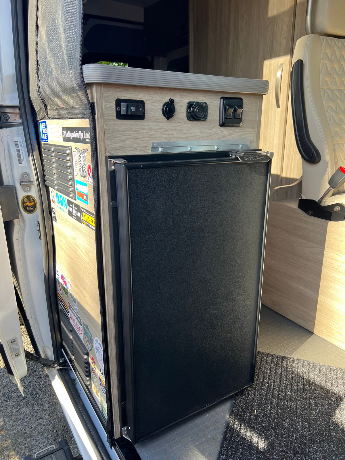and a ladder to the bunk area. Practical and cozy.|Inside an RV rental — photo 14