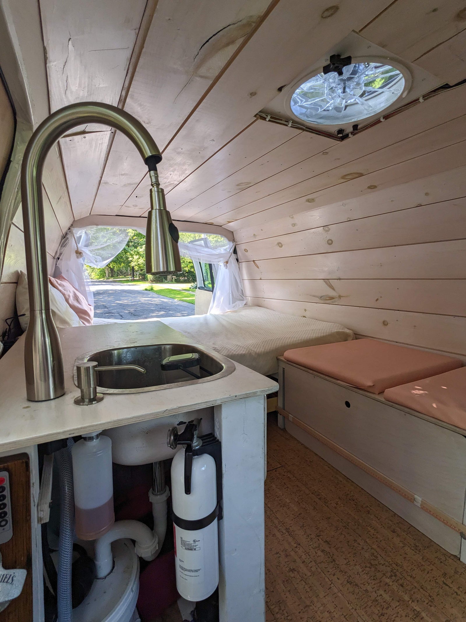 Cozy n cute 2014 Ford Econoline - sink, solar power, wood paneling