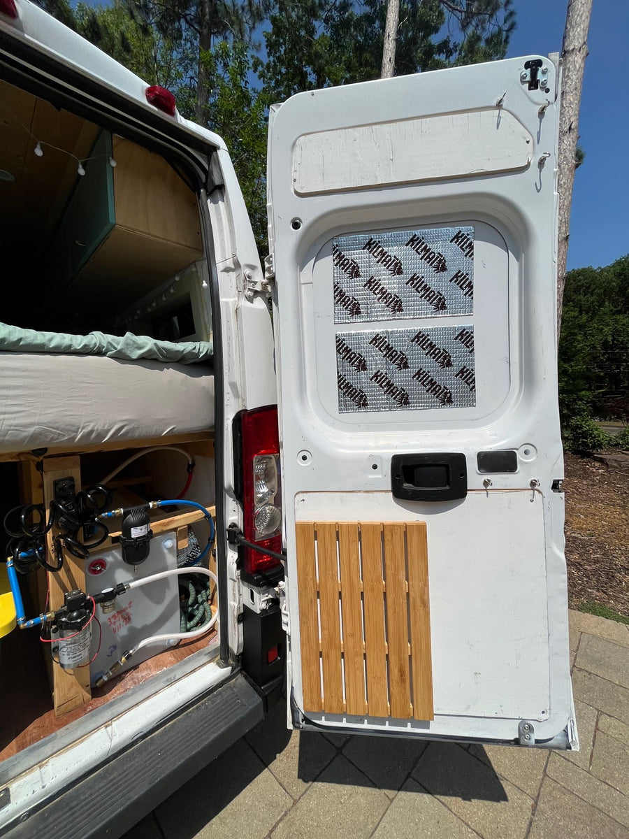and smart storage solutions.|Cozy RV rental interior with overhead storage