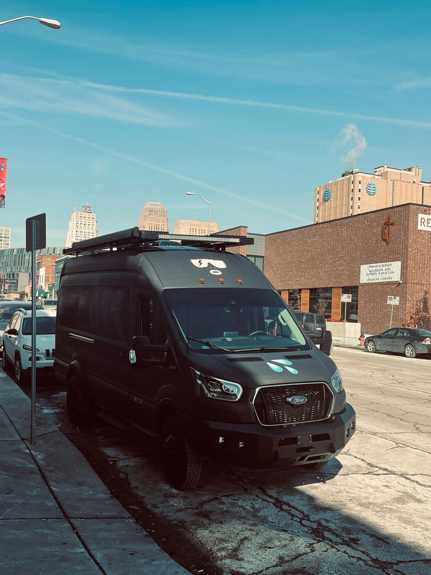 snowboards & poles. Thule/Yakima roof boxes visible.|This rv rental van interior features a custom boot dryer/storage system with blue and red ski boots
