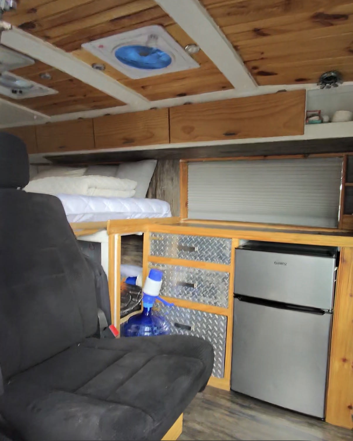 ideal for outdoor showers/changing.|This RV rental camper van features an Alu-Cab privacy tent attached to its rear — photo 9