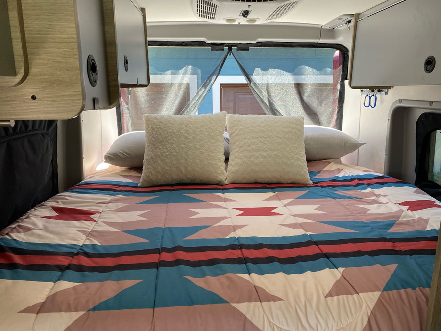 and scenic lake views for your next adventure.|Winnebago RV rental interior: compact camper van with kitchen