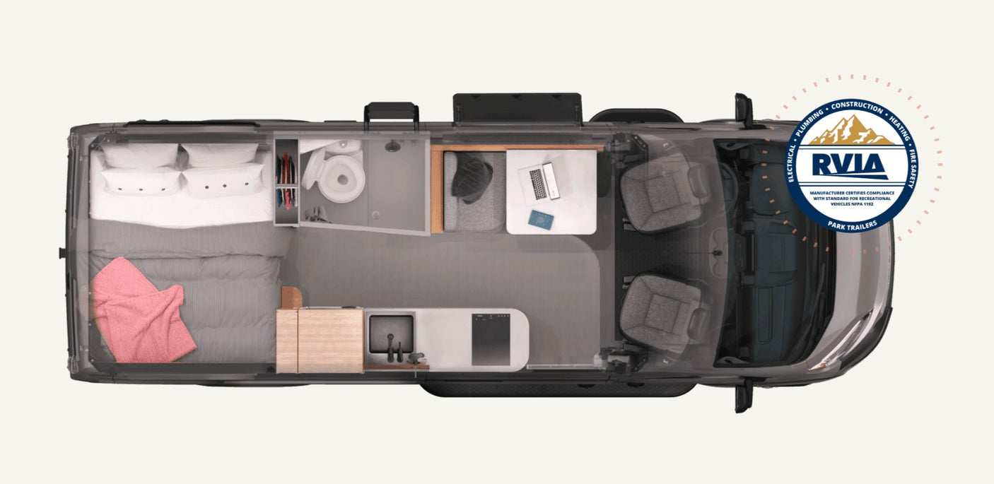Overhead view of a spacious RV rental interior layout, highlighting its bed, kitchen, bathroom, and living areas.