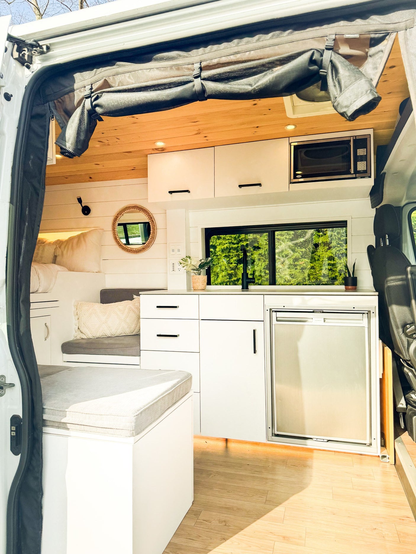 Explore this bright & modern camper van interior