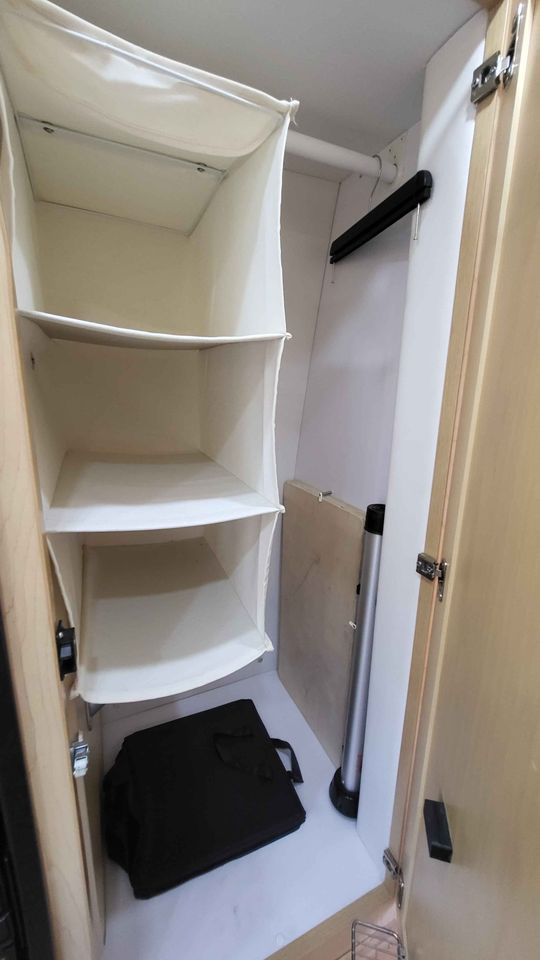and dashboard for your journey.|Explore this RV rental's spacious interior with open rear doors