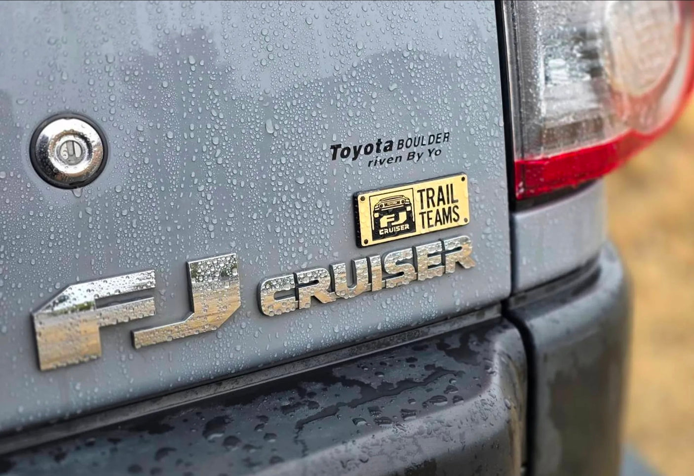 and controls. Ideal for an adventurous RV rental journey.|Close-up of a rugged Toyota FJ Cruiser "Trail Teams" door sill