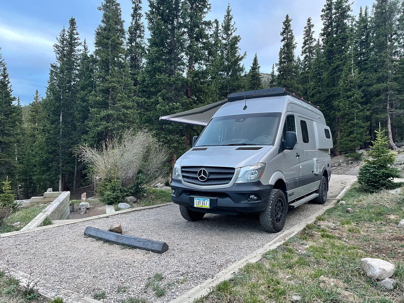offering cozy travel accommodations.|RV rental kitchen: compact with sink