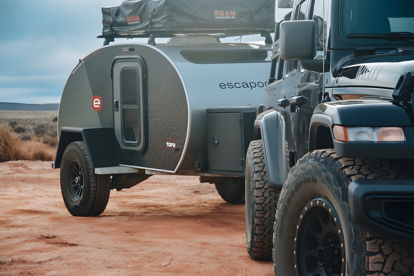 Off-road Jeep & Escapod TOPO teardrop camper (RV rental) in desert. Ready for adventure camping!