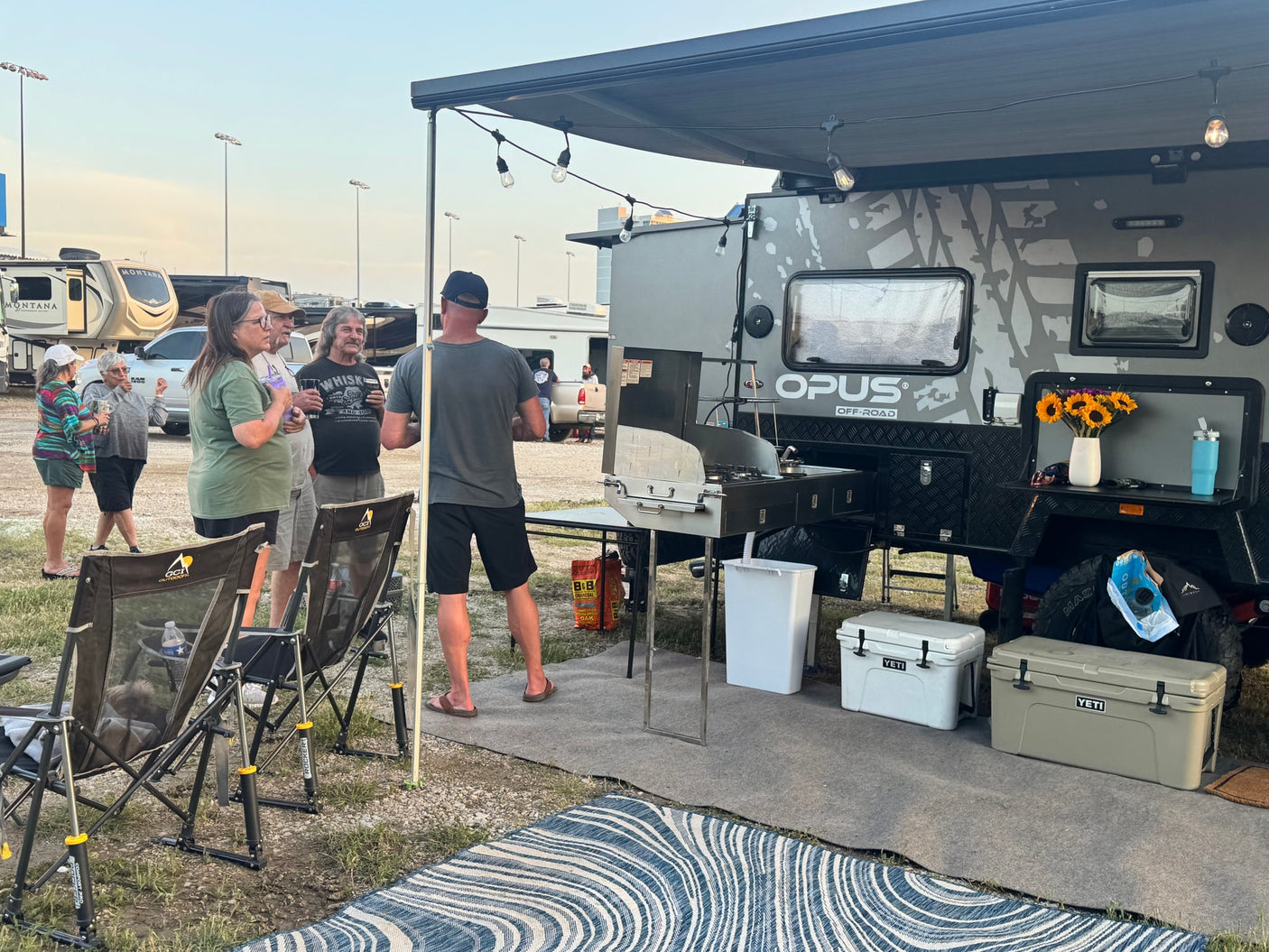 perfect for adventurous camping.|RV rental outdoor cooking: A propane stove with lake views and a picnic area