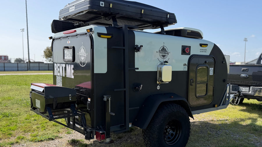 This 'High Altitude Trailer Co.' off-road teardrop camper, available for **rv rental**, features a rooftop tent & rear grill. "Rent Me!"
