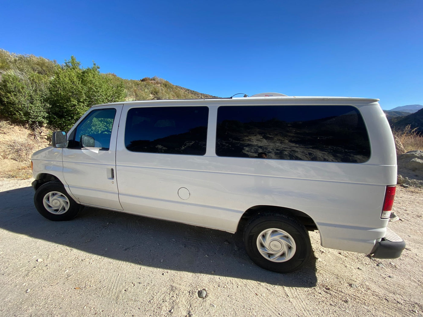 ideal for an RV rental adventure.|White van — photo 3