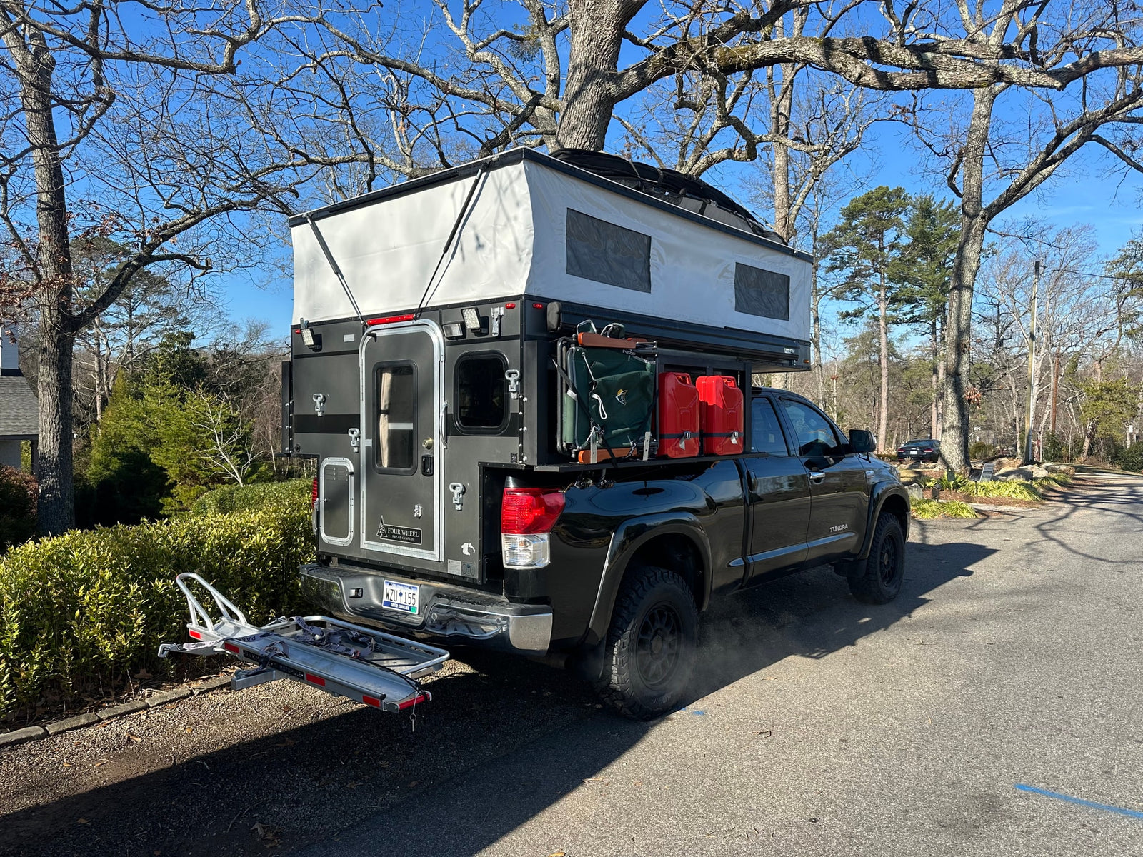 perfect for a rugged rv rental adventure.|Adventure-ready truck camper setup at a Shell station
