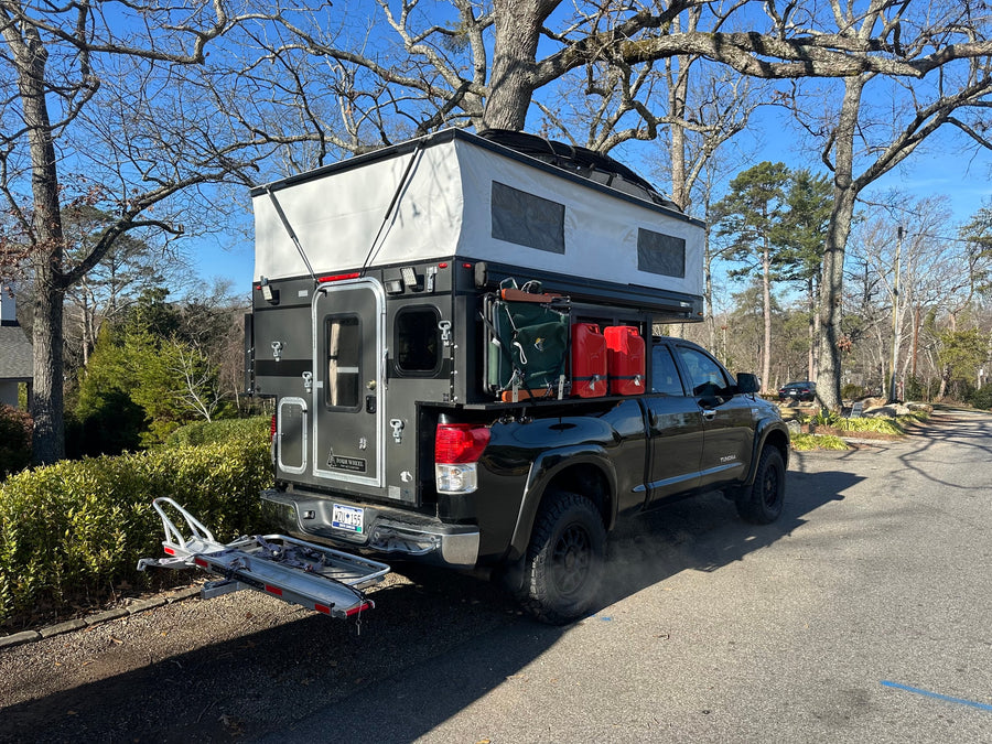 perfect for a rugged rv rental adventure.|Adventure-ready truck camper setup at a Shell station