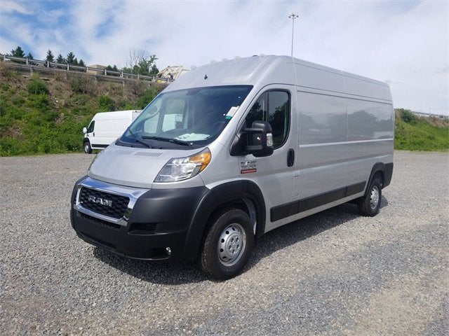 A silver Ram ProMaster cargo van