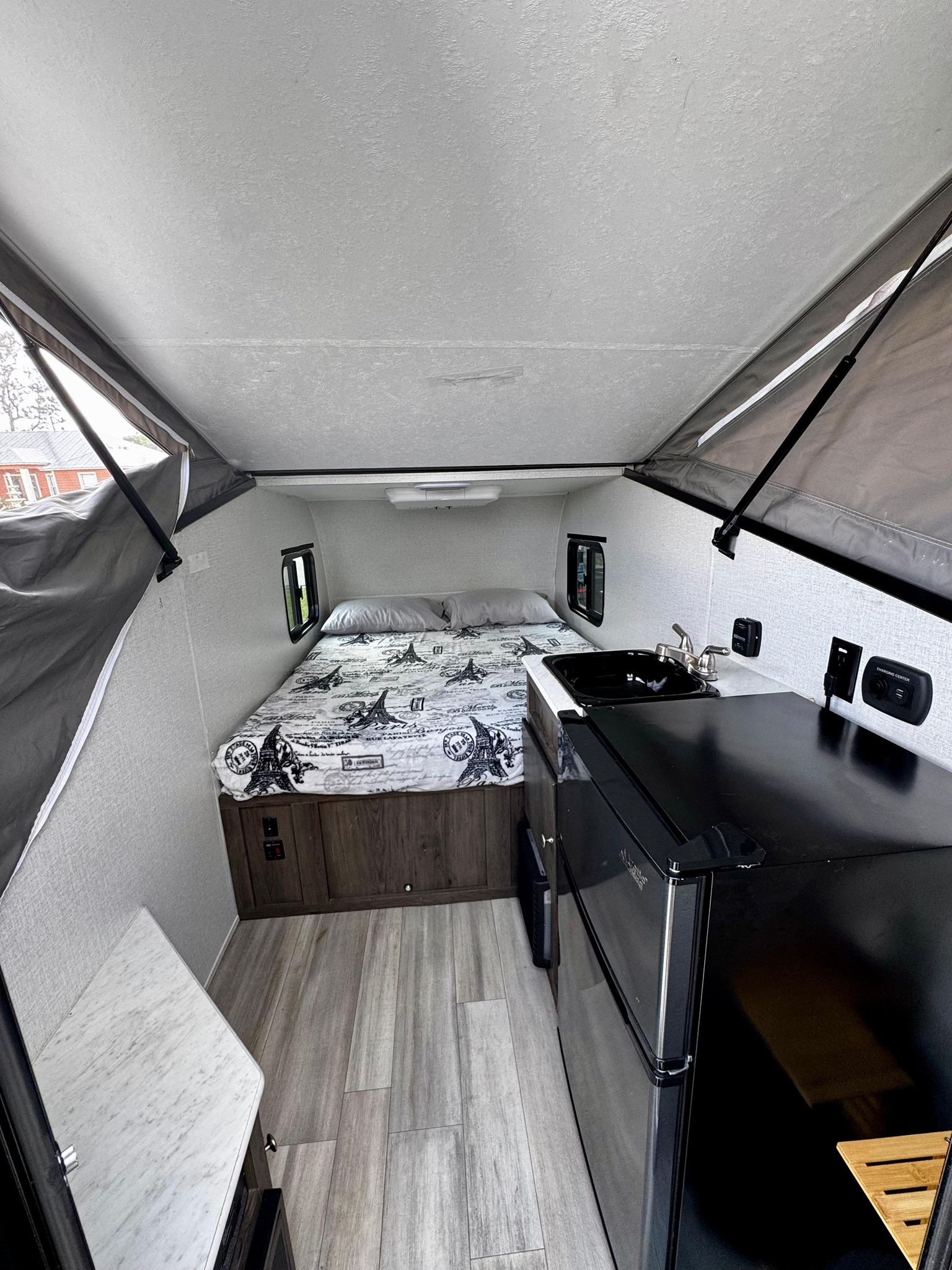 ready for adventure.|A grey Jeep Gladiator tows a Viking pop-up RV rental