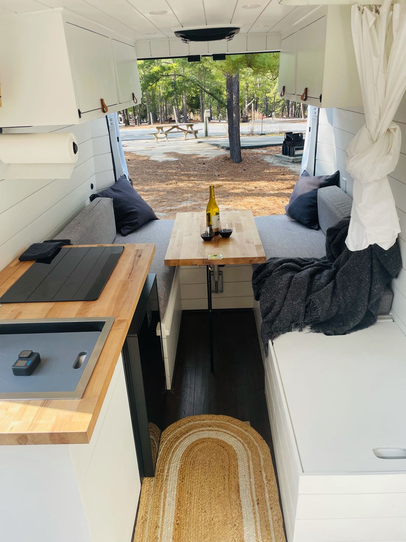 Cozy RV rental interior with kitchen
