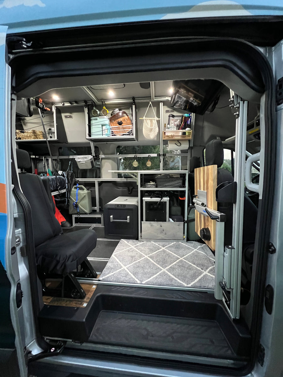 This RV rental offers a well-appointed, compact mobile living space with smart storage and modular shelving.