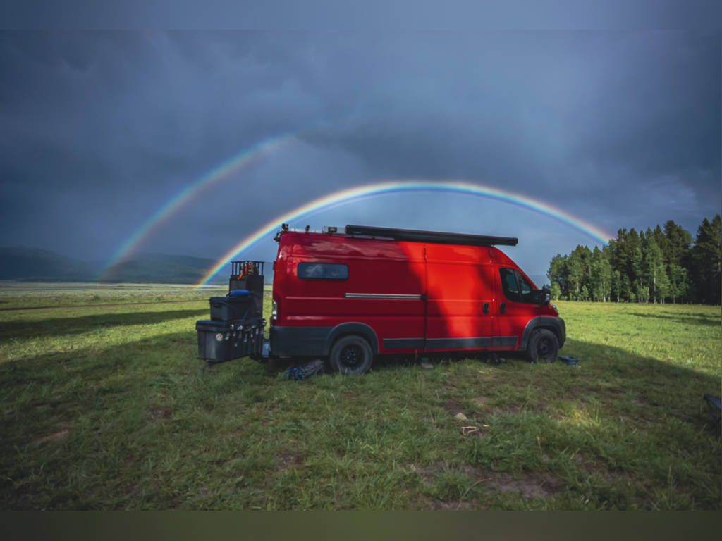 and unique wood-and-resin counter.|RV rental's cozy mobile kitchen: wood & resin countertop