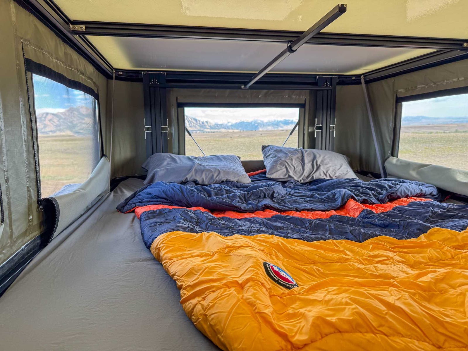 mountains in distance. Ideal for your RV rental adventure.|Rugged BFGoodrich All-Terrain tire on a TRD wheel with red suspension