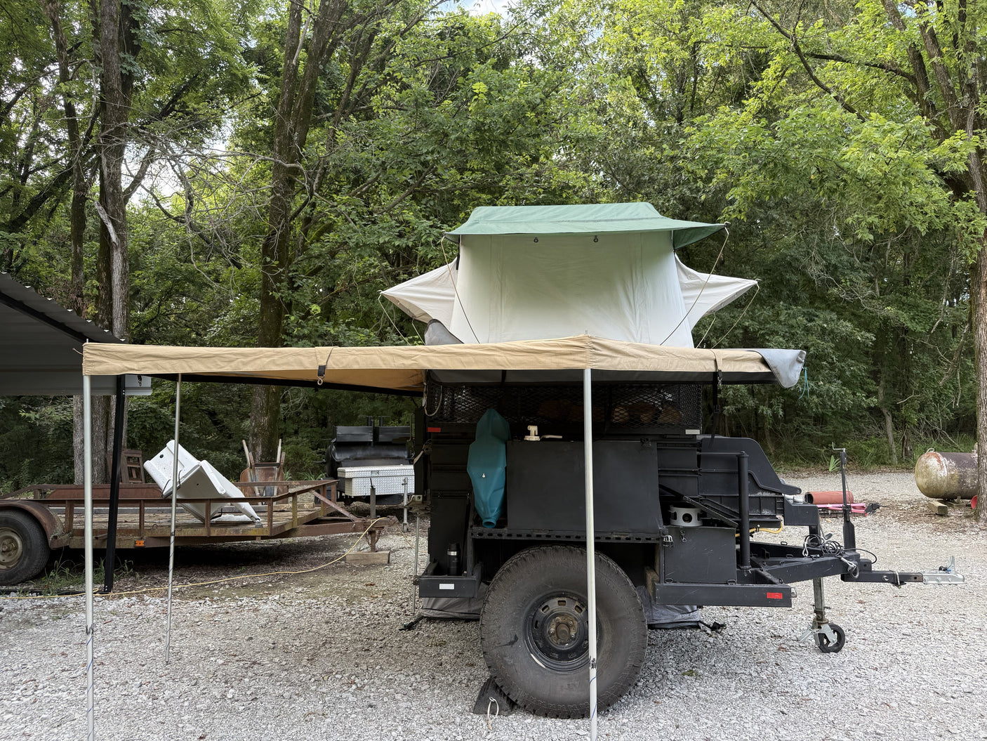Rear view of the rooftop tent with the 270-degree awning open