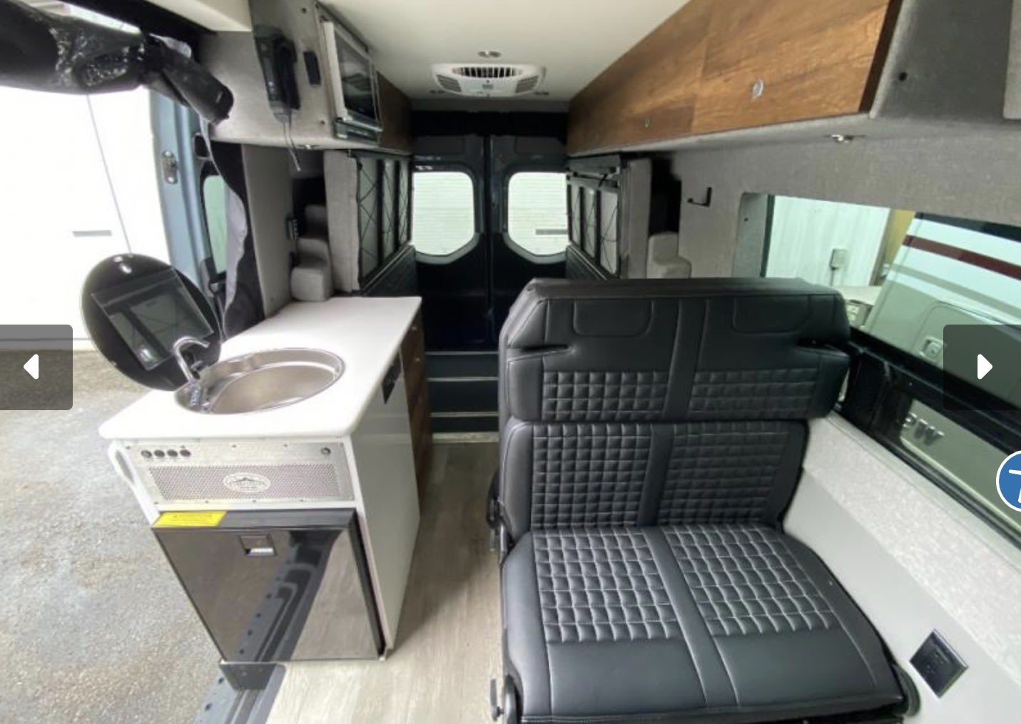 great for rv rental trips and outdoor adventures.|RV rental interior featuring a compact kitchen with sink