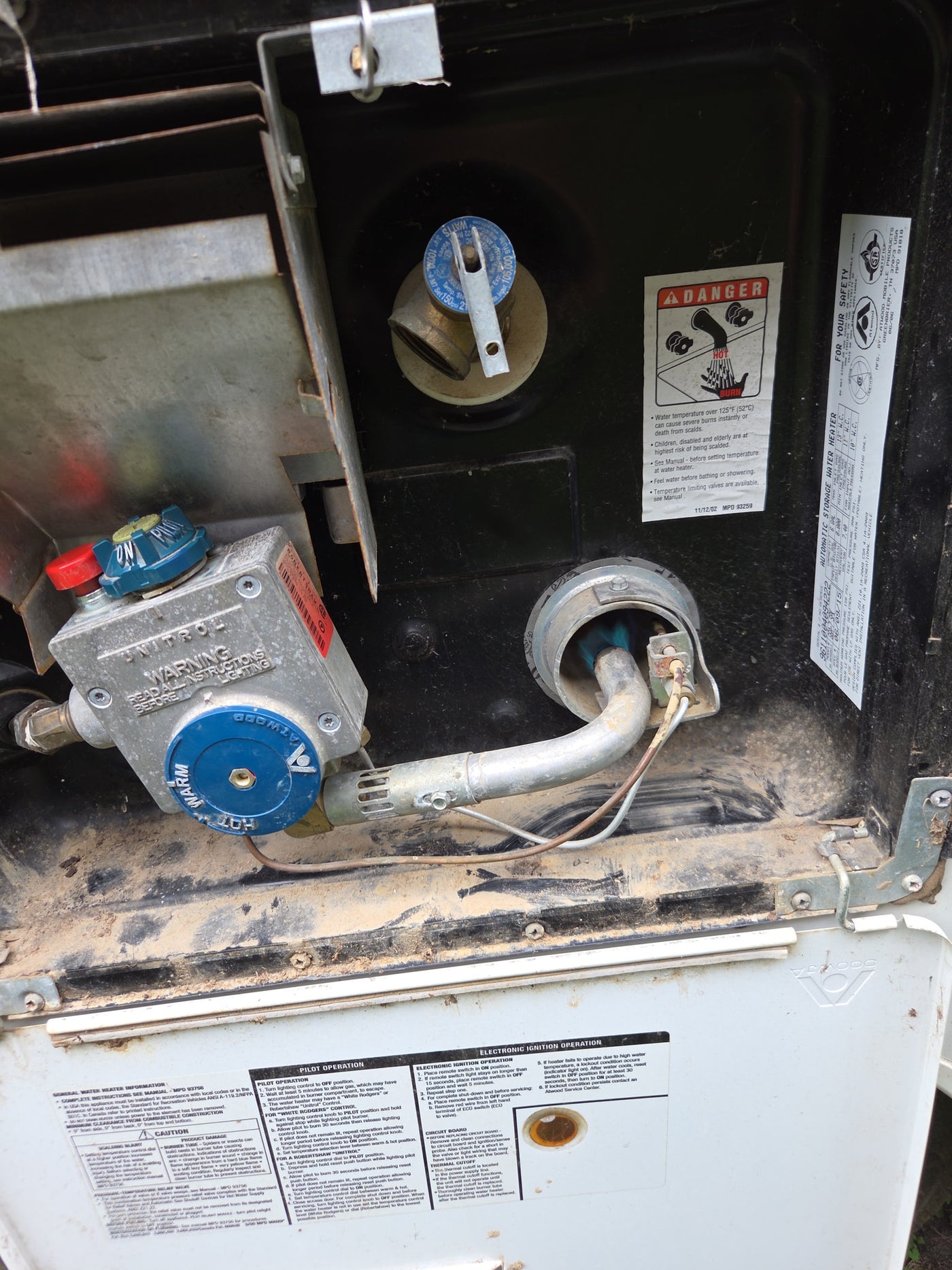 and countertops. Ready for camping adventures and travel.|Inside this RV rental pop-up camper: a bed — photo 4