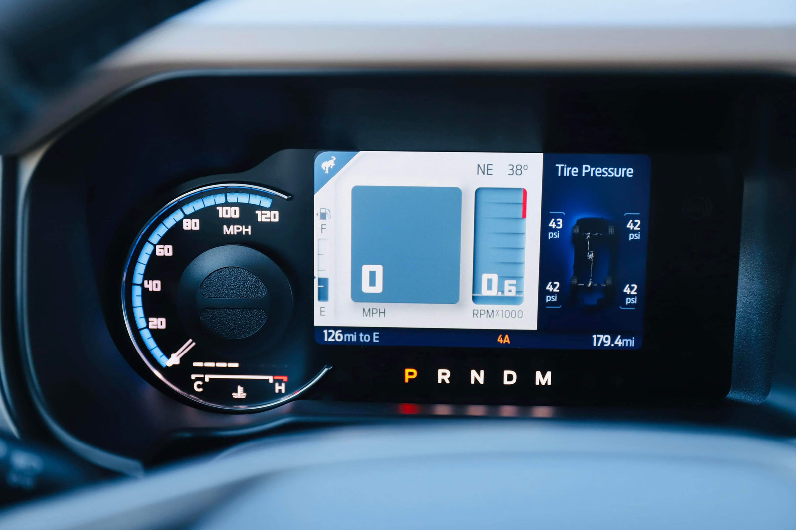 A digital vehicle display shows 0 MPH, 38° temp, near-full fuel, tire pressure, & P for Park. Great for rv rental safety!