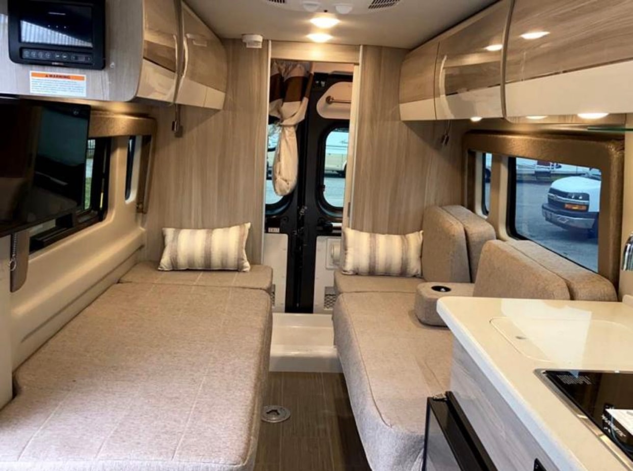 and swivel chairs for travel.|Grey Ram ProMaster RV rental