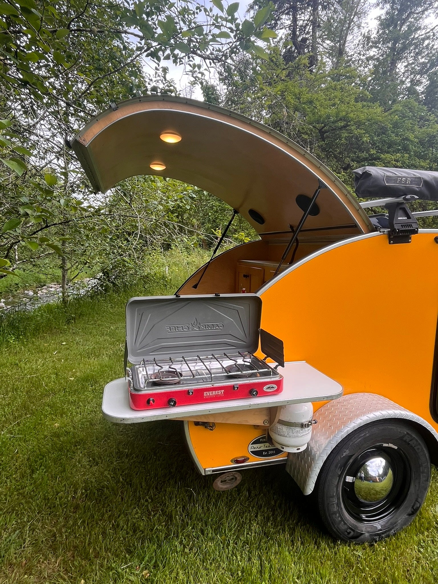 ideal for your next RV rental adventure.|Organized RV rental cabinet shows pots