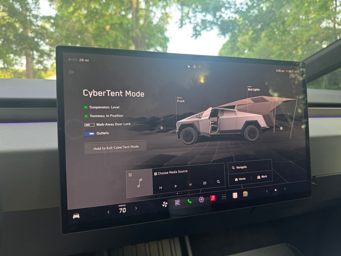 Tesla Cybertruck's CyberTent Mode UI shows its integrated tent, leveling, and power outlets; ideal for an rv rental or camping adventure.