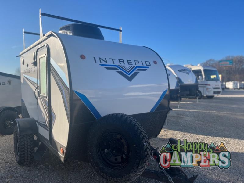 ideal for off-grid adventures.|Compact RV rental floor plan: 12' 8 1/8" trailer layout with kitchen